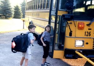 Will and Janet at school bus.