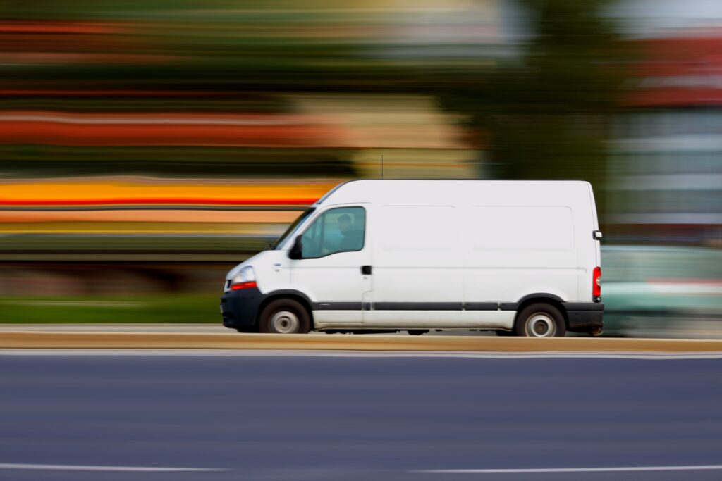 white van with blurred background to represent fleet safety program